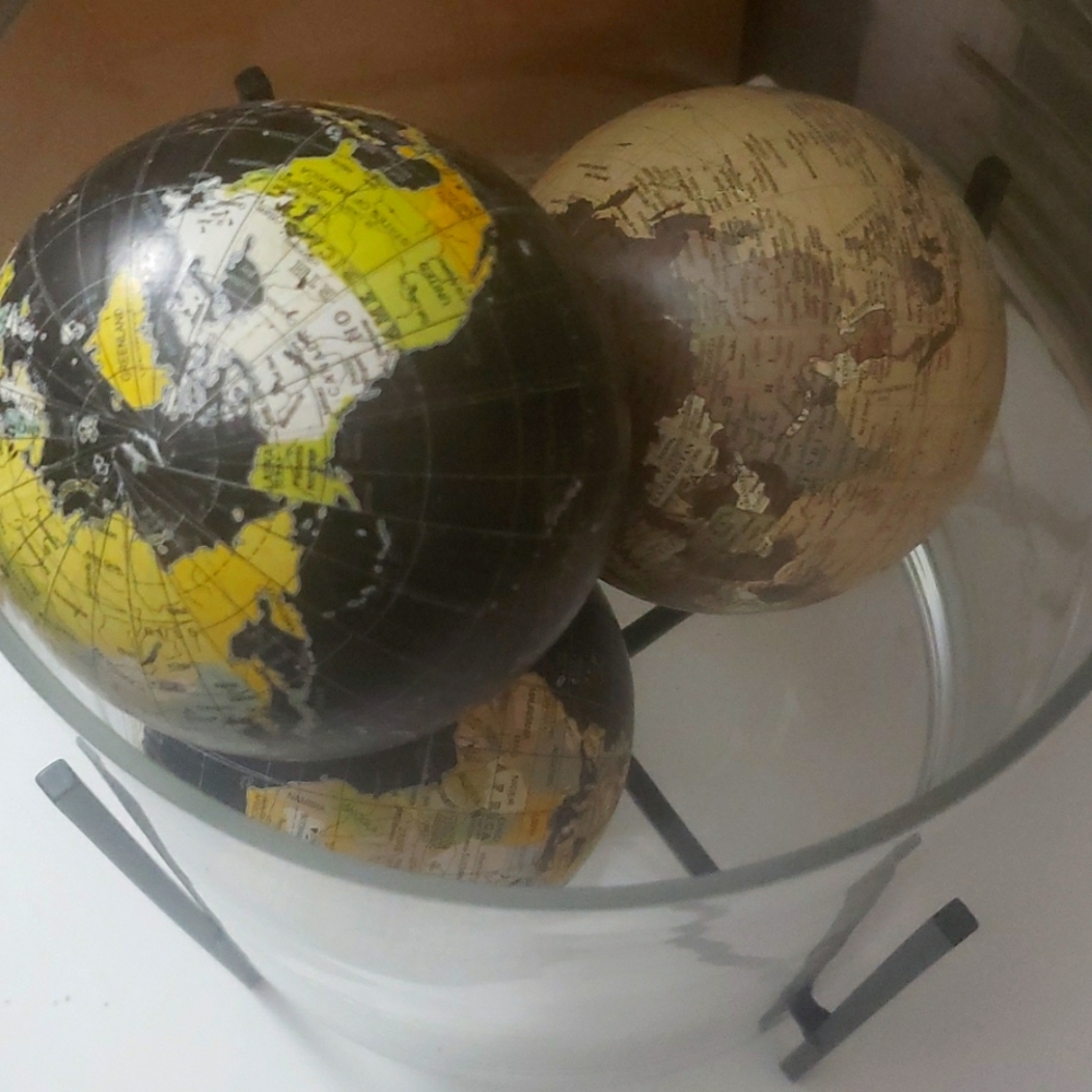 3 small decorative globes